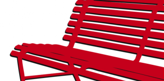 Una panchina rossa al parco 1° maggio